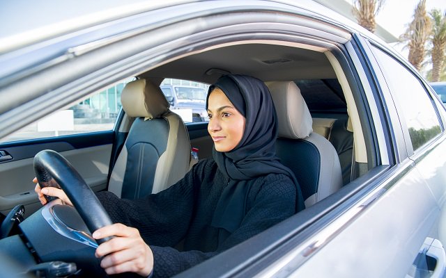 A woman driving during a lesson