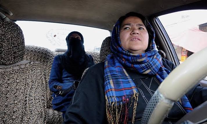 A female instructor and learner during a driving lesson